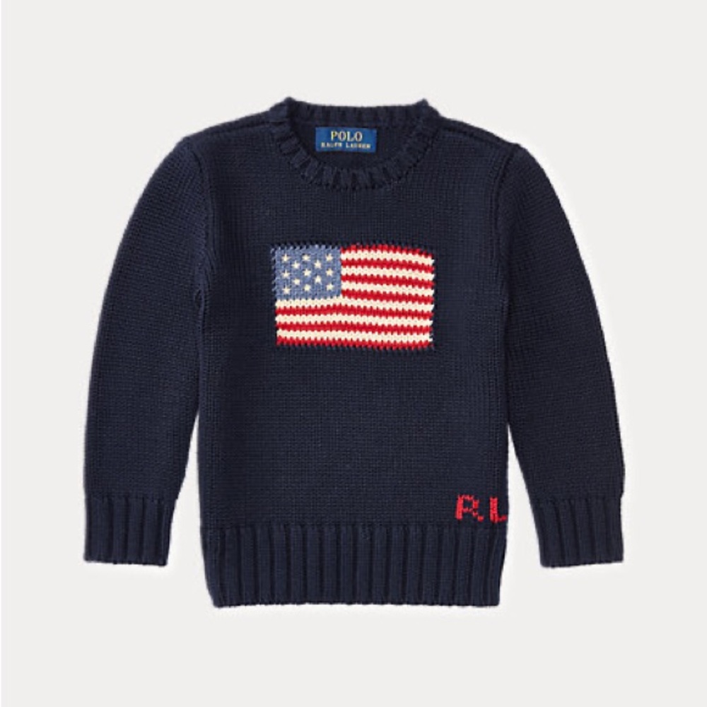 With puffed sleeves and an intarsia-knit flag